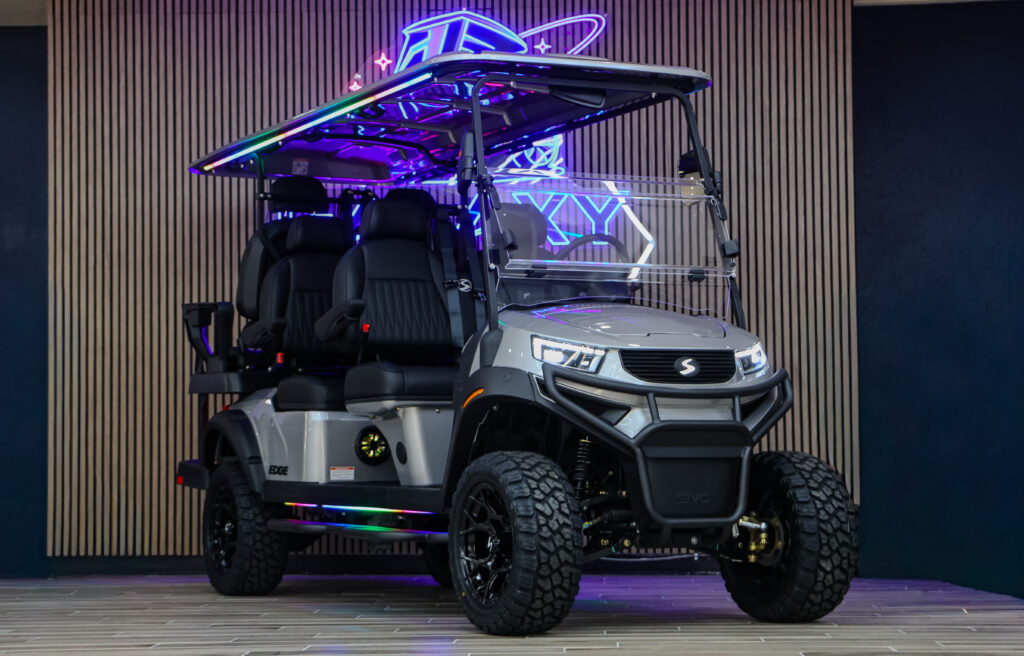 Silver 2026 Sivo Edge 6 Seater Lifted golf cart displayed at Galaxy Golf Cars with premium seating and lifted suspension